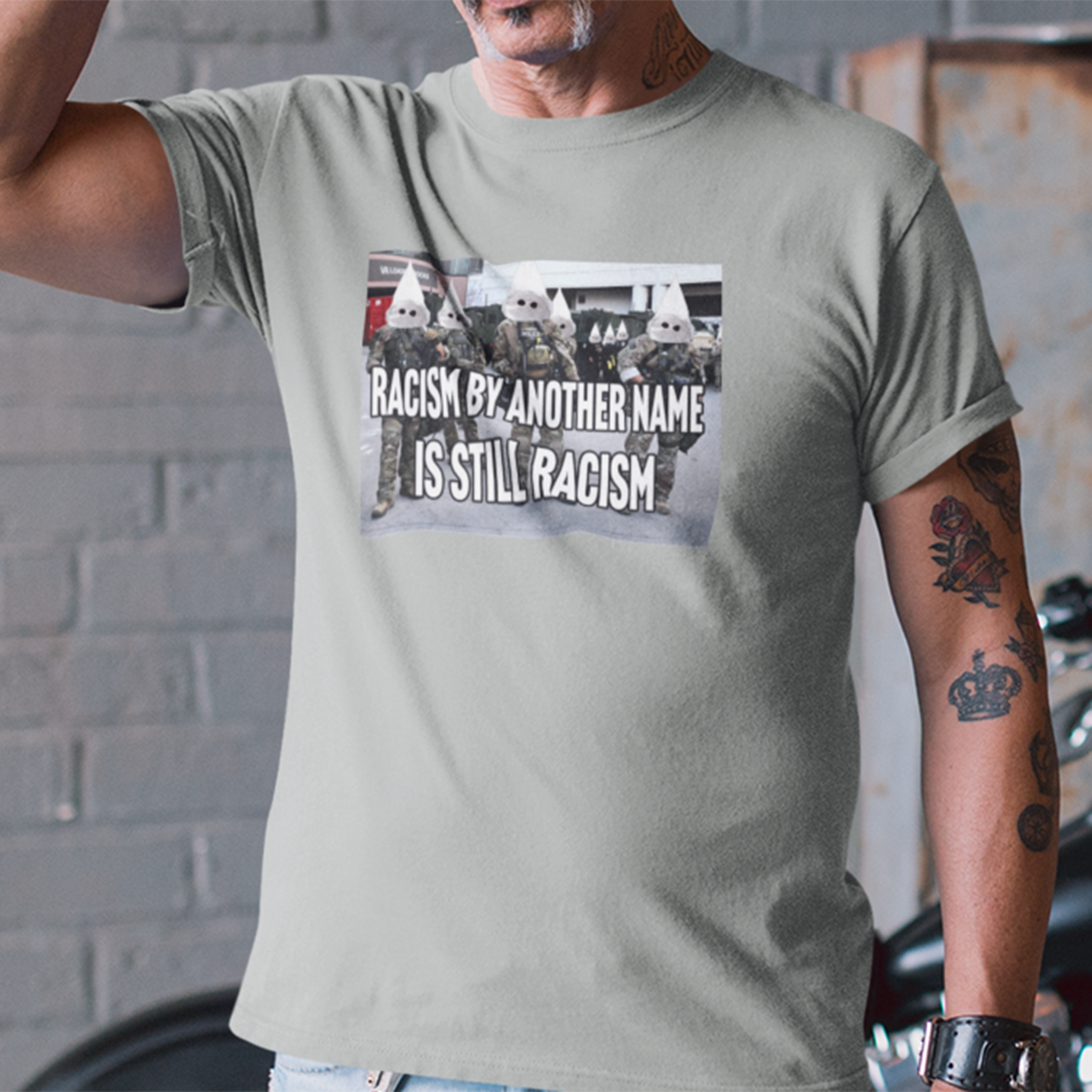 RACISM IS STILL RACISM T-SHIRT/ATHLETIC HEATHER