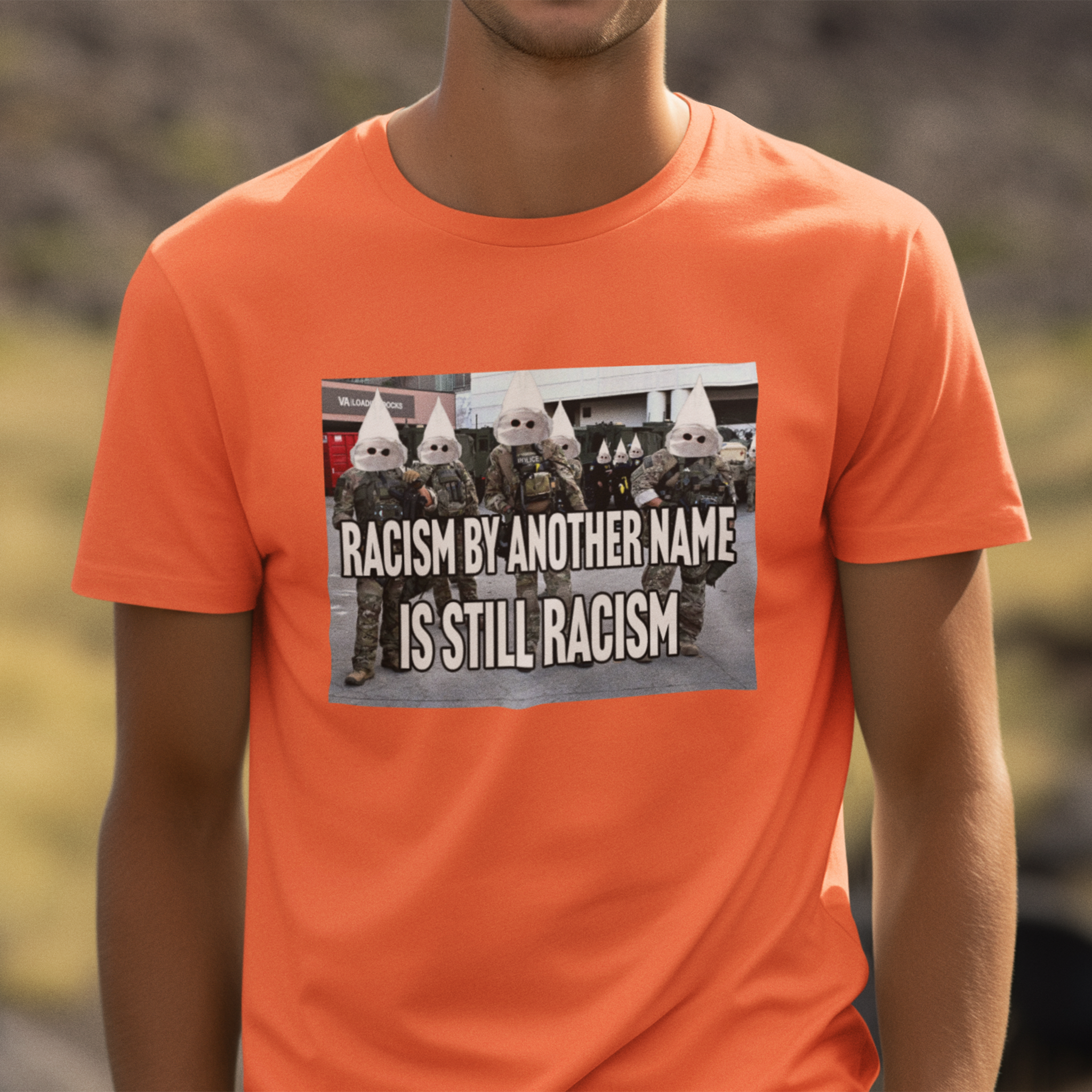 RACISM IS STILL RACISM T-SHIRT/ORANGE